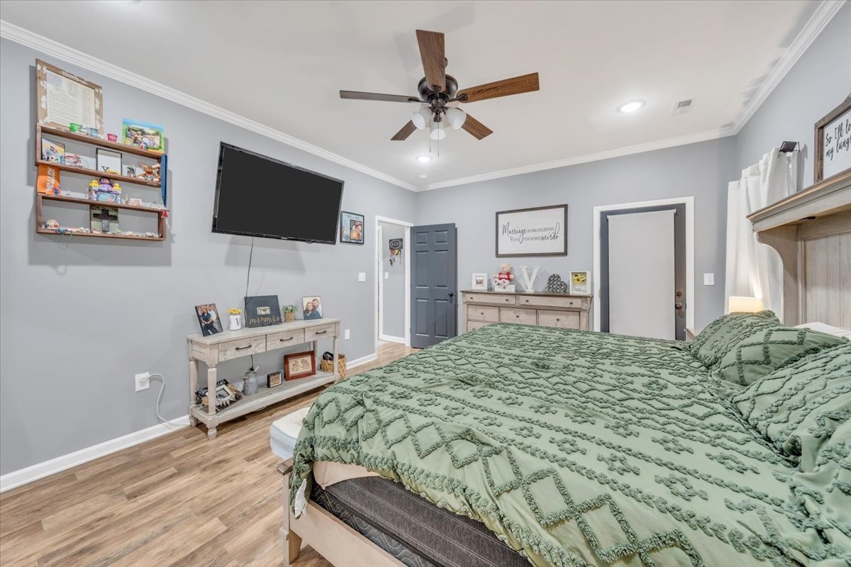 8 Valley Pond Lane Kelso, TN 37348 - Photo 29 of 75 a bedroom with a bed and a flat screen tv