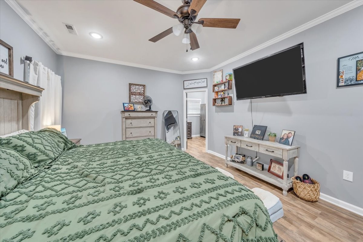 8 Valley Pond Lane Kelso, TN 37348 - Photo 31 of 75 a bedroom with a bed and a flat screen tv
