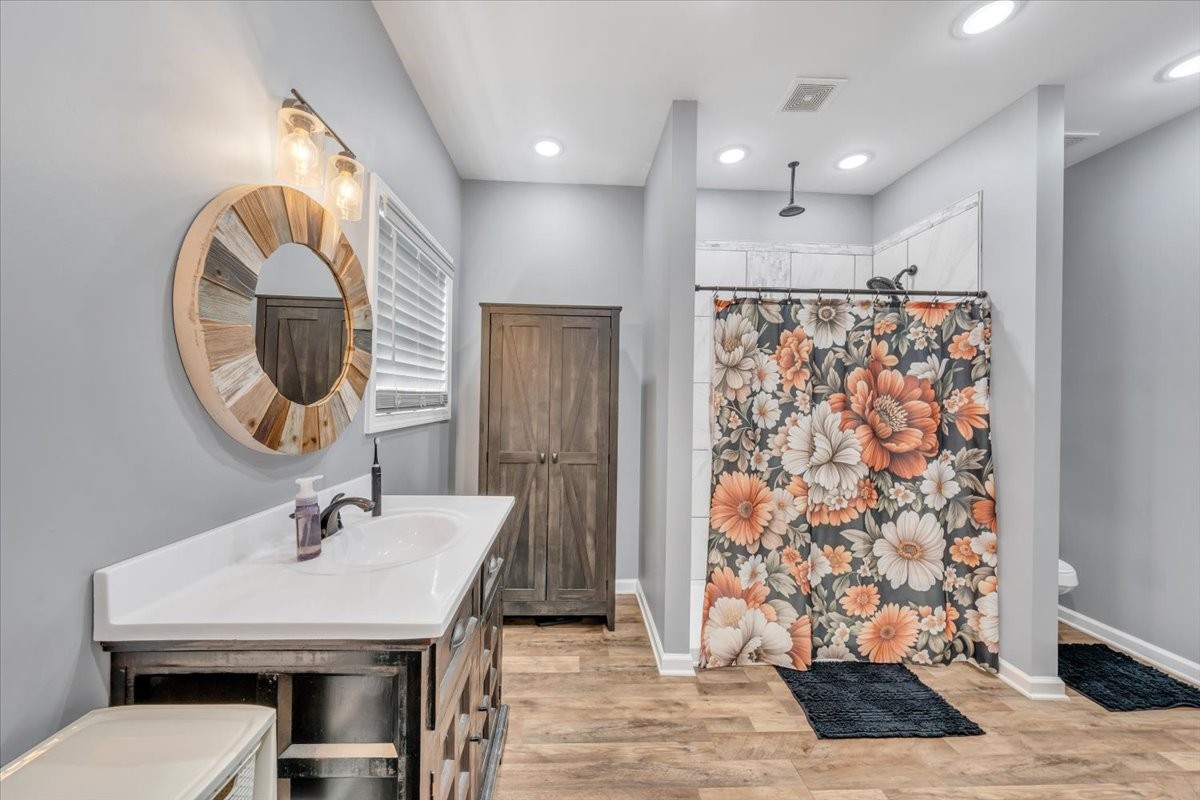 8 Valley Pond Lane Kelso, TN 37348 - Photo 34 of 75 a bathroom with a sink and a mirror