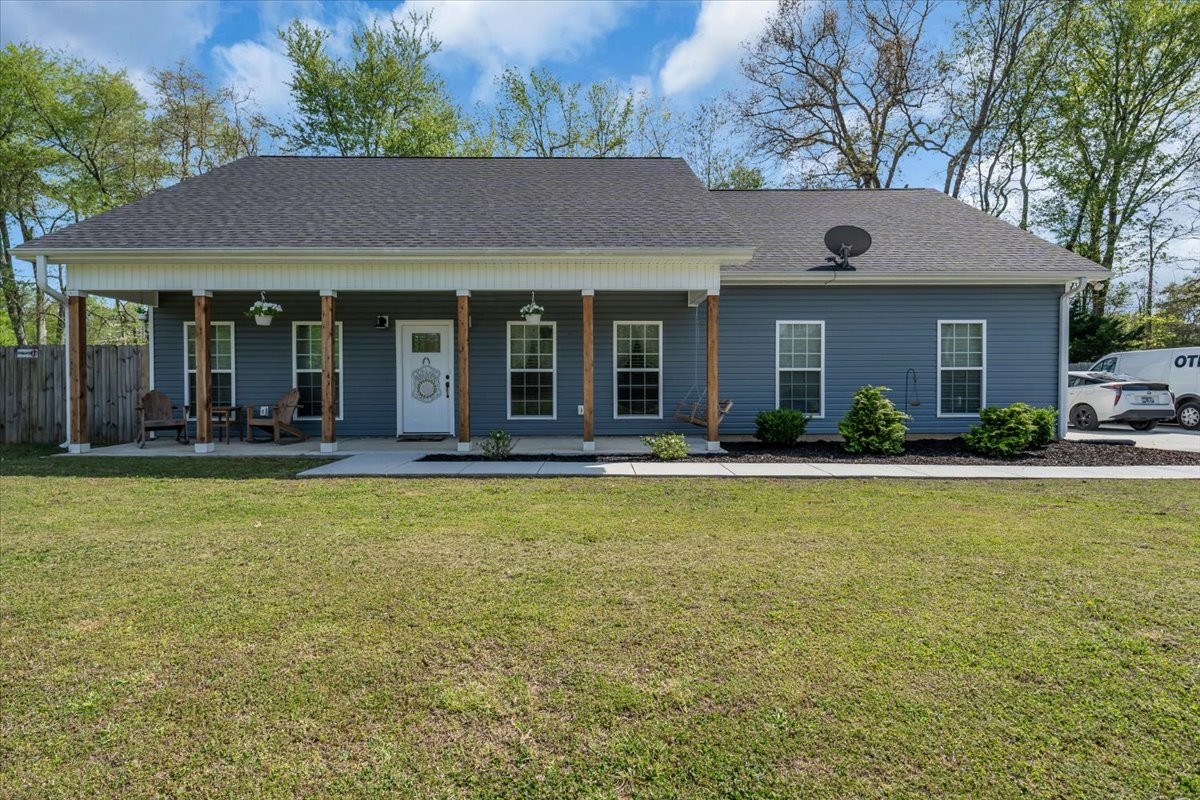 8 Valley Pond Lane Kelso, TN 37348 - Photo 45 of 75 a front view of a house with swimming pool and porch