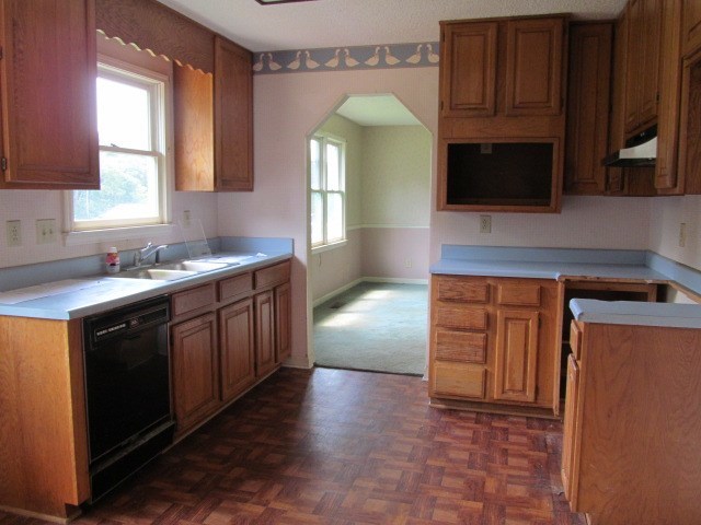 3044 Graham Road Gray, GA 31032 - Photo 8 of 11 a kitchen with stainless steel appliances granite countertop a stove a microwave and a sink