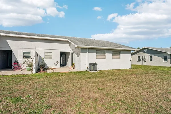a house view with a backyard space