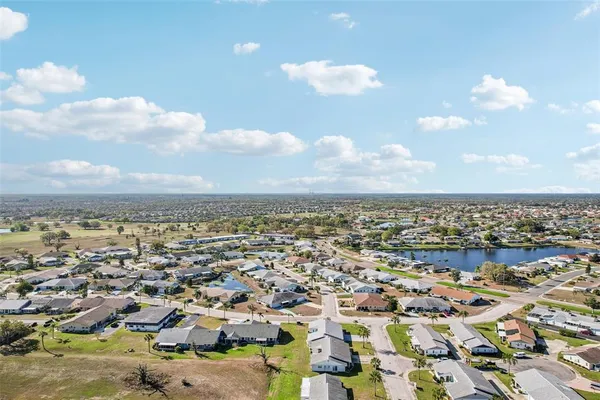a view of a swimming pool with a garden