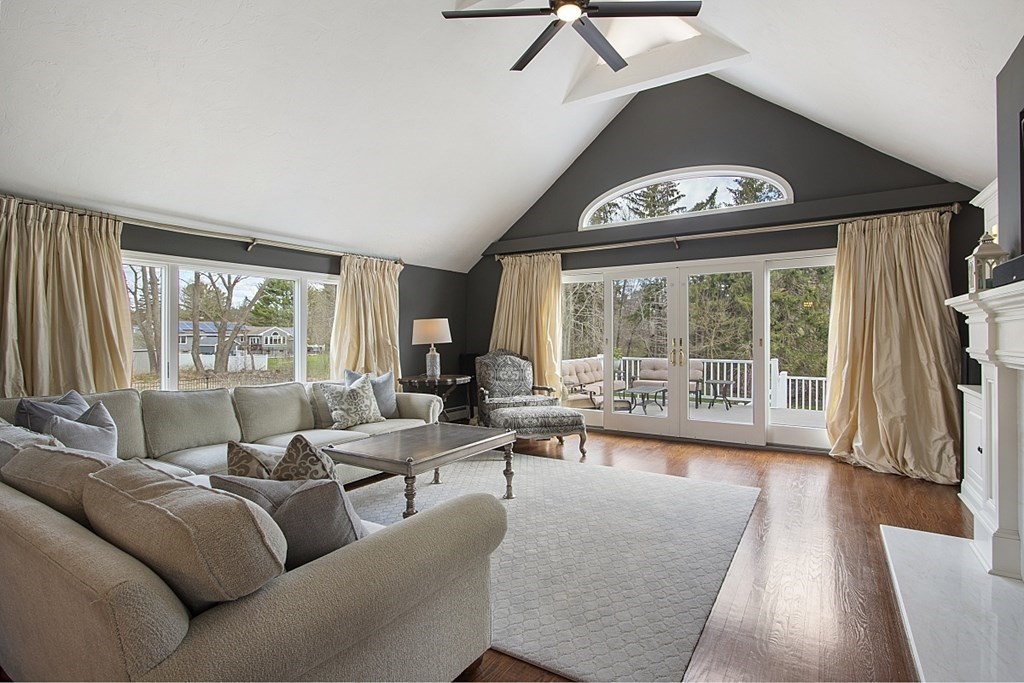 97 Argilla Road Andover, MA 01810 - Photo 12 of 42 a living room with furniture and a large window