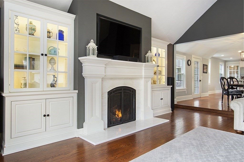 97 Argilla Road Andover, MA 01810 - Photo 14 of 42 a living room with furniture and a fireplace