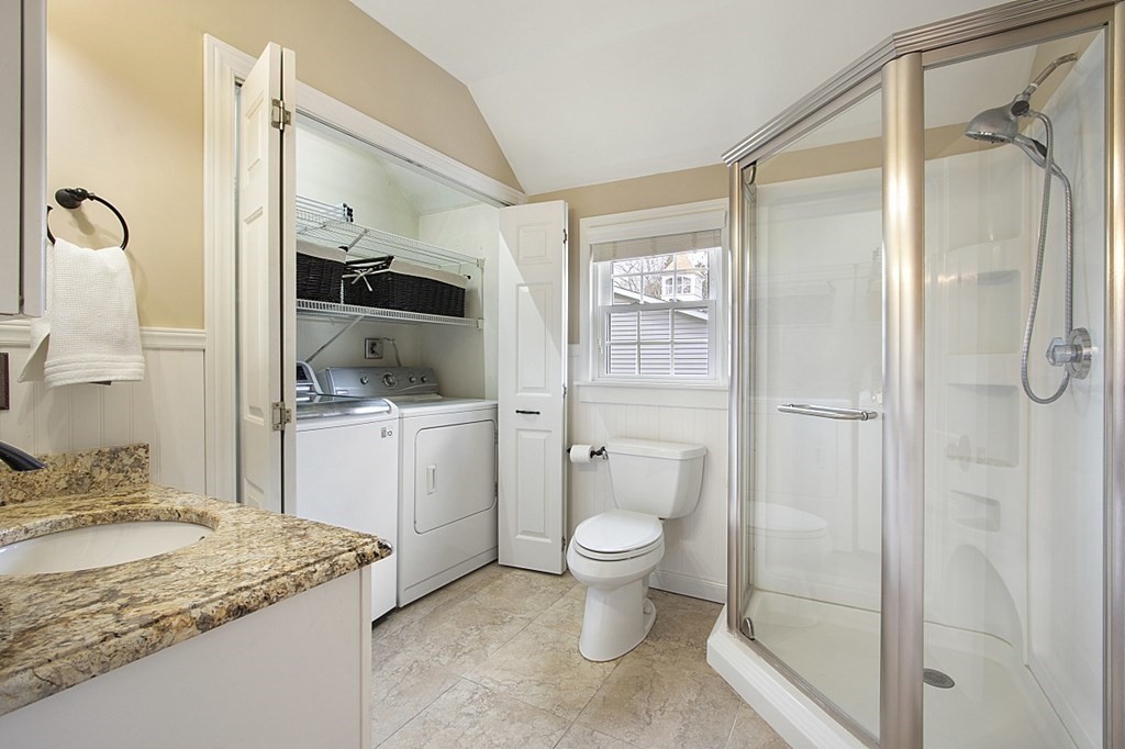 97 Argilla Road Andover, MA 01810 - Photo 15 of 42 a bathroom with a granite countertop sink toilet and shower