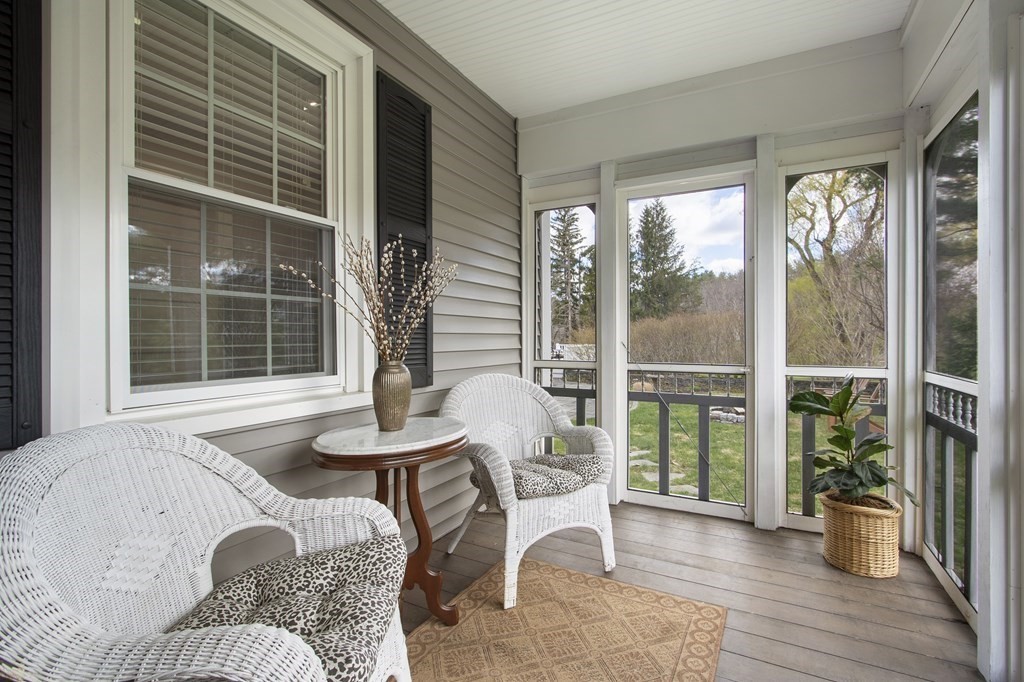 97 Argilla Road Andover, MA 01810 - Photo 18 of 42 a view of a livingroom with furniture and front door