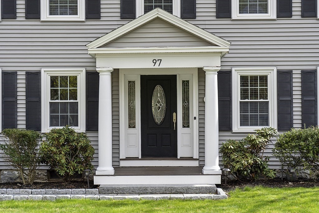 97 Argilla Road Andover, MA 01810 - Photo 2 of 42 a front view of a house with a yard