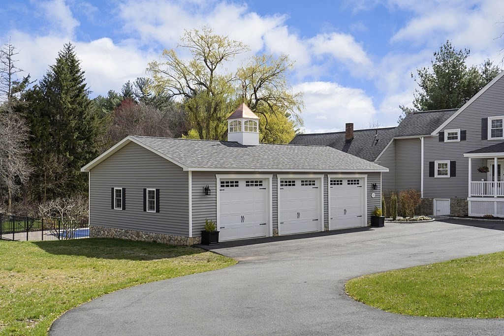 97 Argilla Road Andover, MA 01810 - Photo 30 of 42 front view of a house with a yard