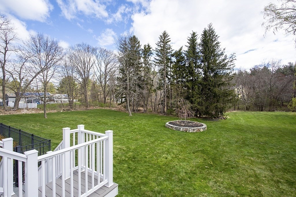 97 Argilla Road Andover, MA 01810 - Photo 36 of 42 a swimming pool with outdoor seating and garden