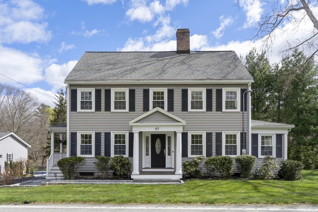 97 Argilla Road Andover, MA 01810 - Photo 42 of 42 a front view of a house with a garden