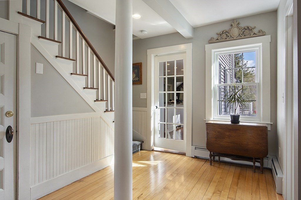 97 Argilla Road Andover, MA 01810 - Photo 5 of 42 a view of a livingroom with furniture and hardwood floor