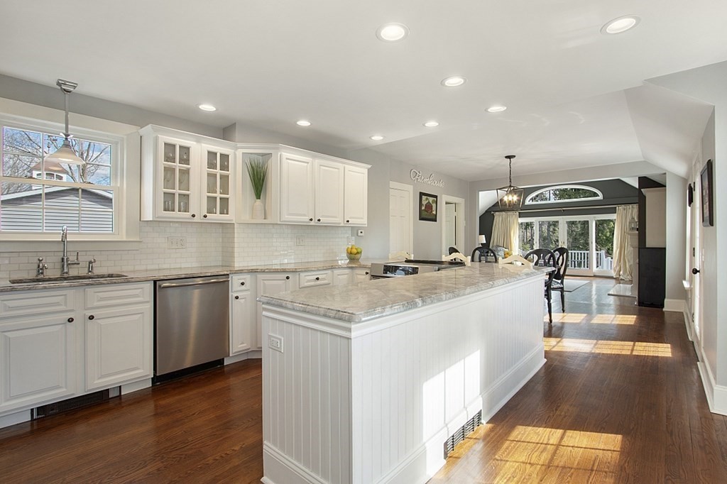 97 Argilla Road Andover, MA 01810 - Photo 8 of 42 a large white kitchen with a large window