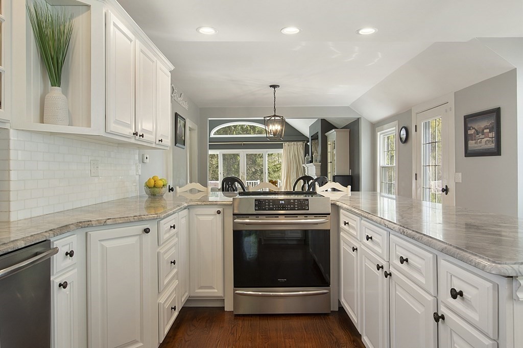 97 Argilla Road Andover, MA 01810 - Photo 9 of 42 a kitchen with white cabinets and sink