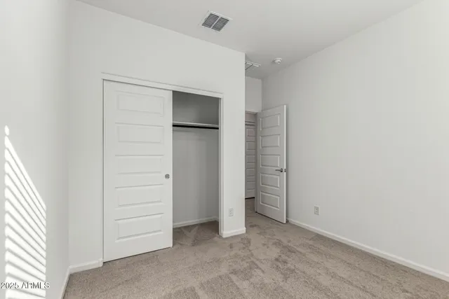an empty room with closet