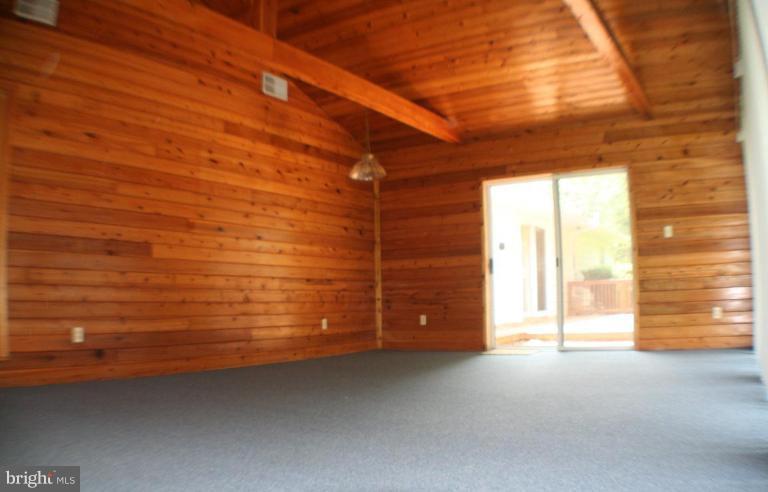 304 Warfieldsburg Road Westminster, MD 21157 - Photo 6 of 19 a view of an empty room with a empty space