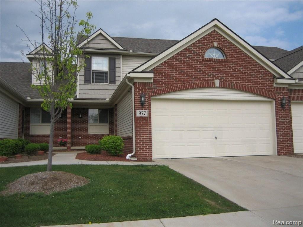 4716 Summer Ridge Drive, Unit 34 Howell, MI 48843 - Photo 1 of 5 Outside View 2009 May.jpg