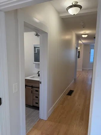 a bathroom with a sink and mirror