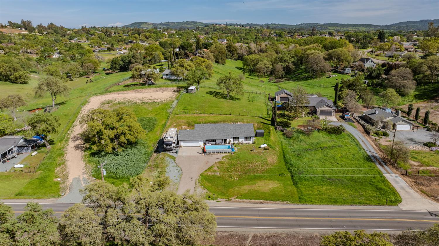 7761 Jenny Lind Road Valley Springs, CA 95252 - Photo 26 of 35 an aerial view of residential houses with outdoor space and trees