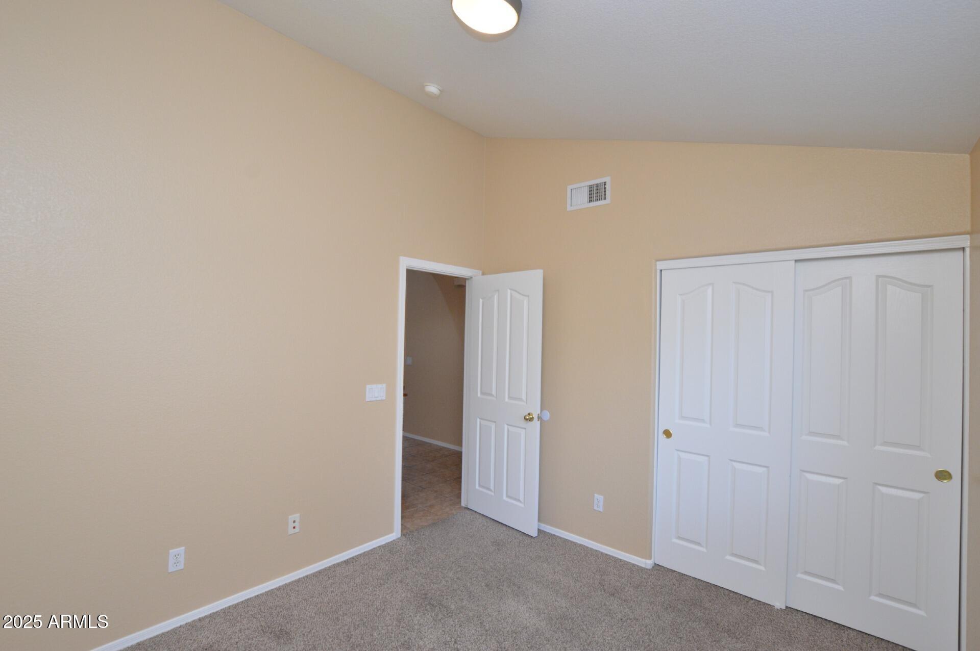 4094 East Rustler Way Gilbert, AZ 85297 - Photo 15 of 34 an empty room with closet area