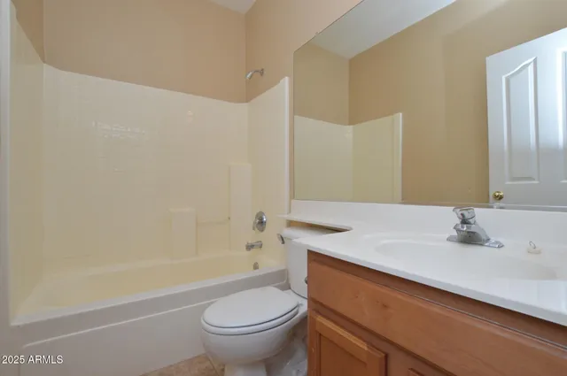 a bathroom with a sink a toilet and a bathtub