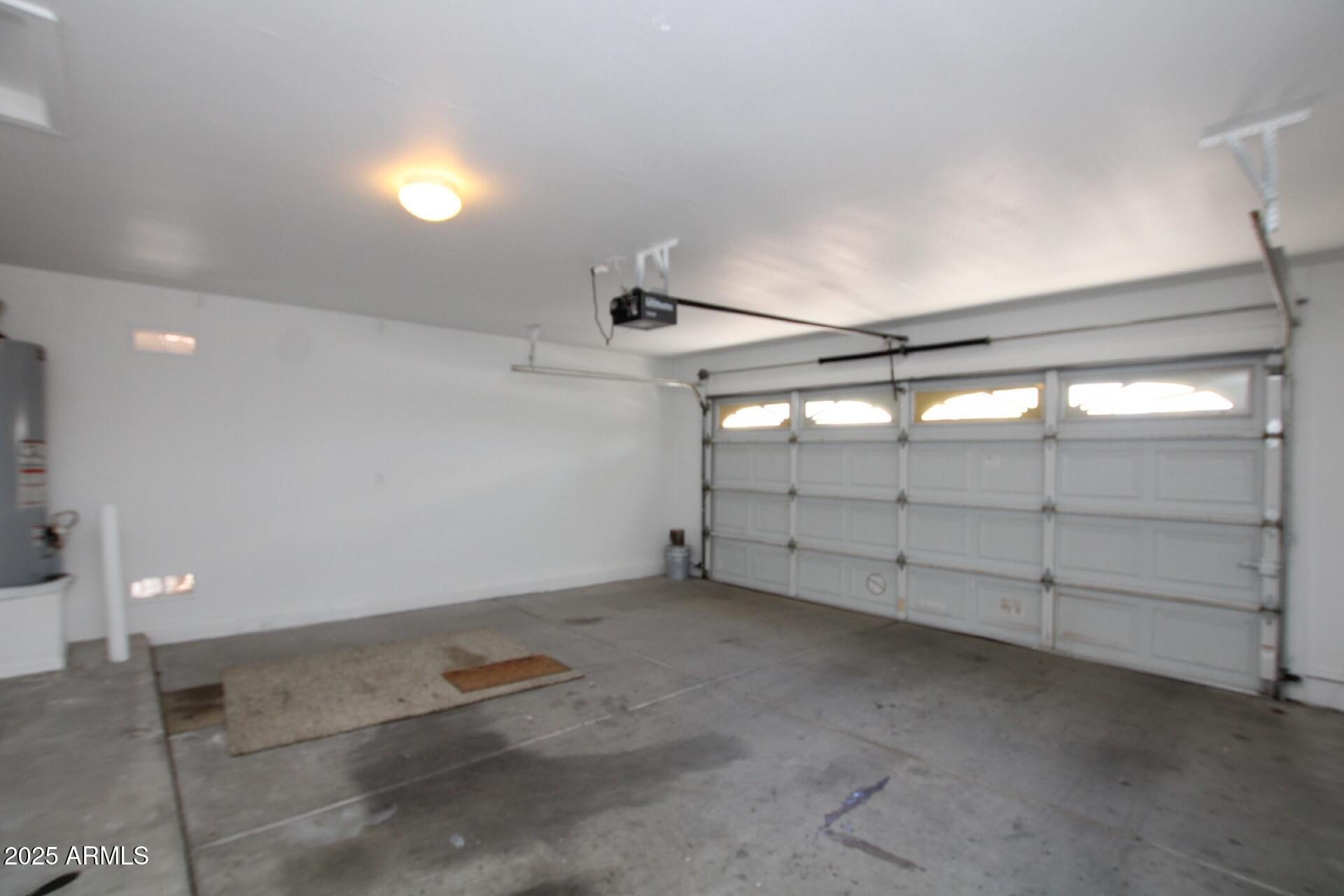 4094 East Rustler Way Gilbert, AZ 85297 - Photo 22 of 34 a view of a garage