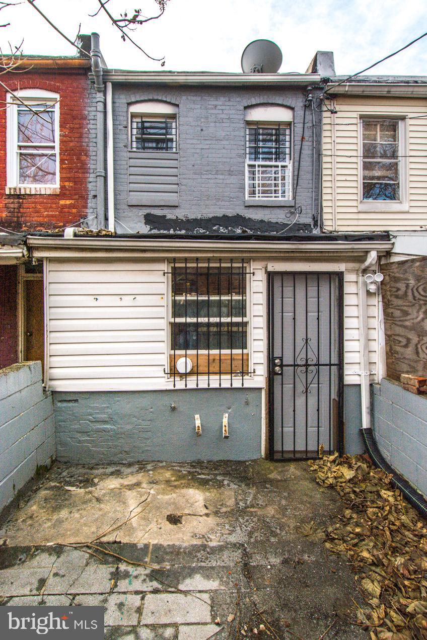 2228 Christian Street Baltimore, MD 21223 - Photo 16 of 16 a view of a house with a outdoor space