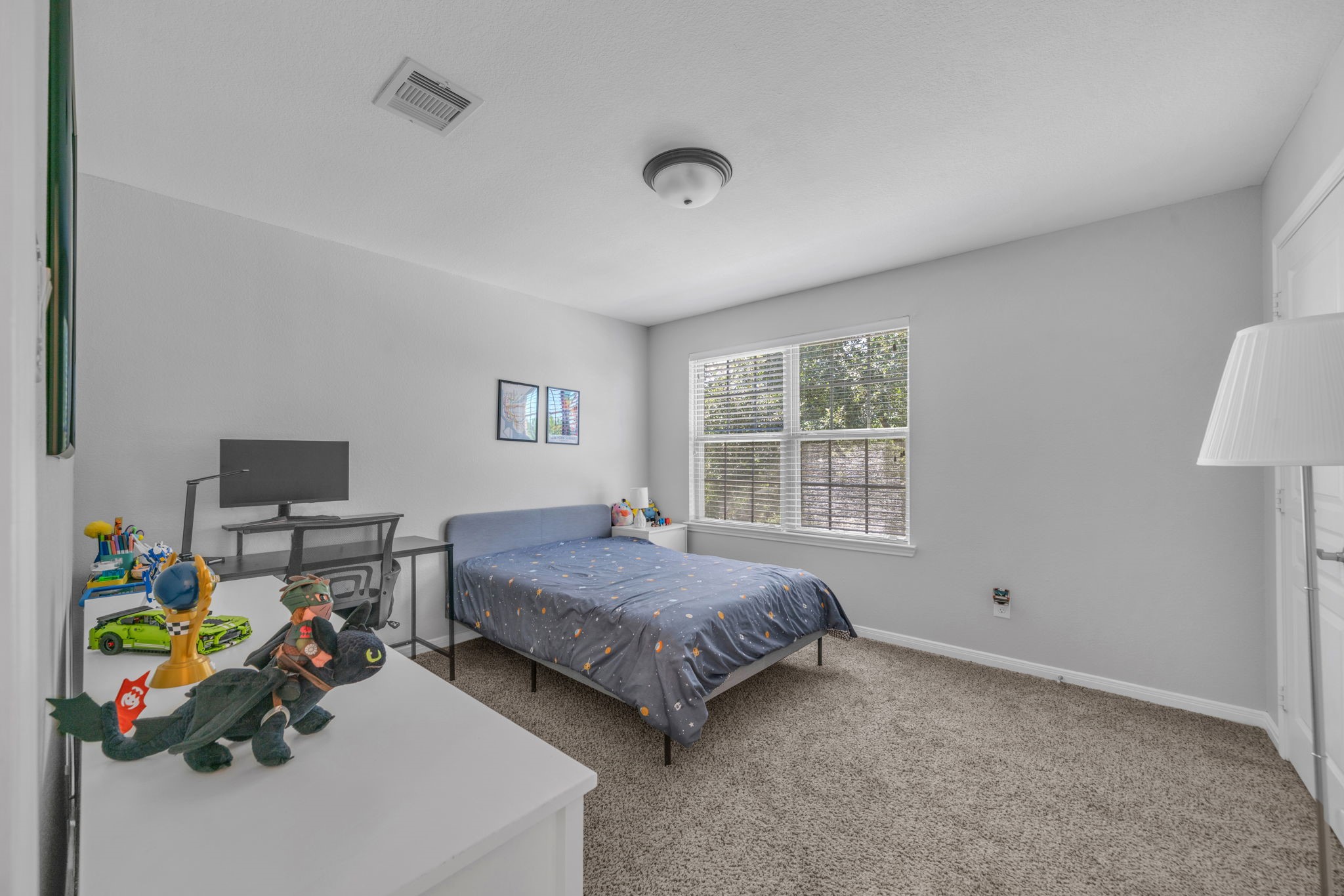 6427 Addlestone Ridge Lane Katy, TX 77494 - Photo 16 of 32 Secondary upstairs bedroom with spacious layout.
