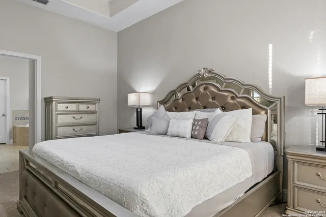 a bedroom with a bed and a closet