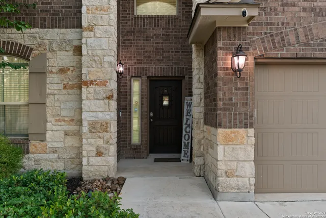 a front view of a house with a garage