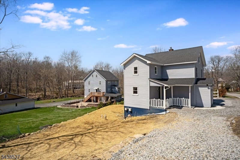 83 Highway 15 Lafayette, NJ 07848 - Photo 16 of 20 a front view of a house with a yard