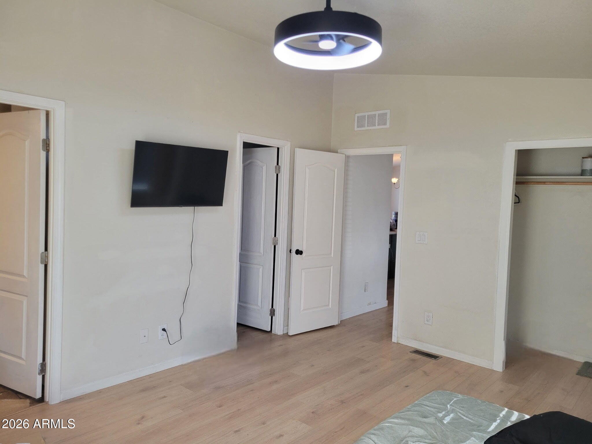 5002 West Bethany Home Road, Unit 33 Glendale, AZ 85301 - Photo 6 of 12 a view of a livingroom with a flat screen tv