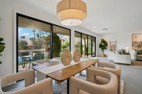 a kitchen with stainless steel appliances a refrigerator stove and microwave