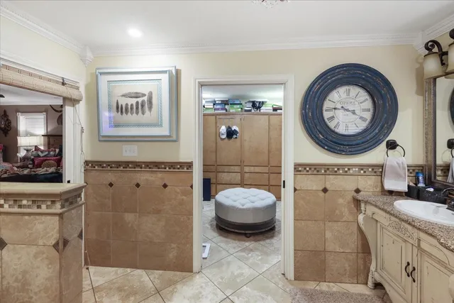 a bathroom with a double vanity sink mirror and double