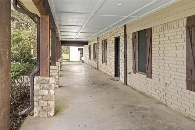 a view of a porch of a house