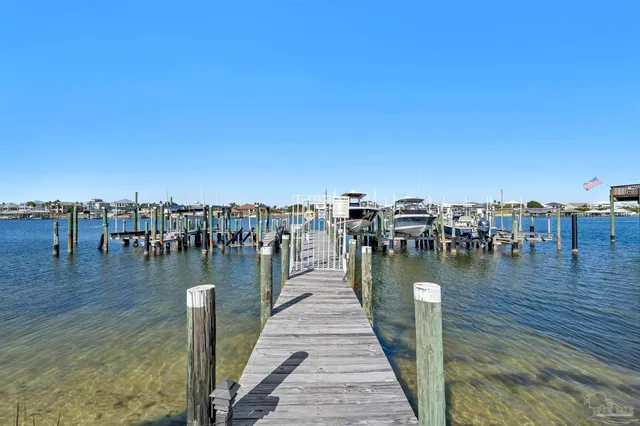 a view of an empty room with closet