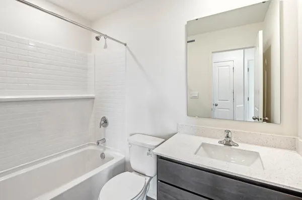 a bathroom with a sink and a bathtub