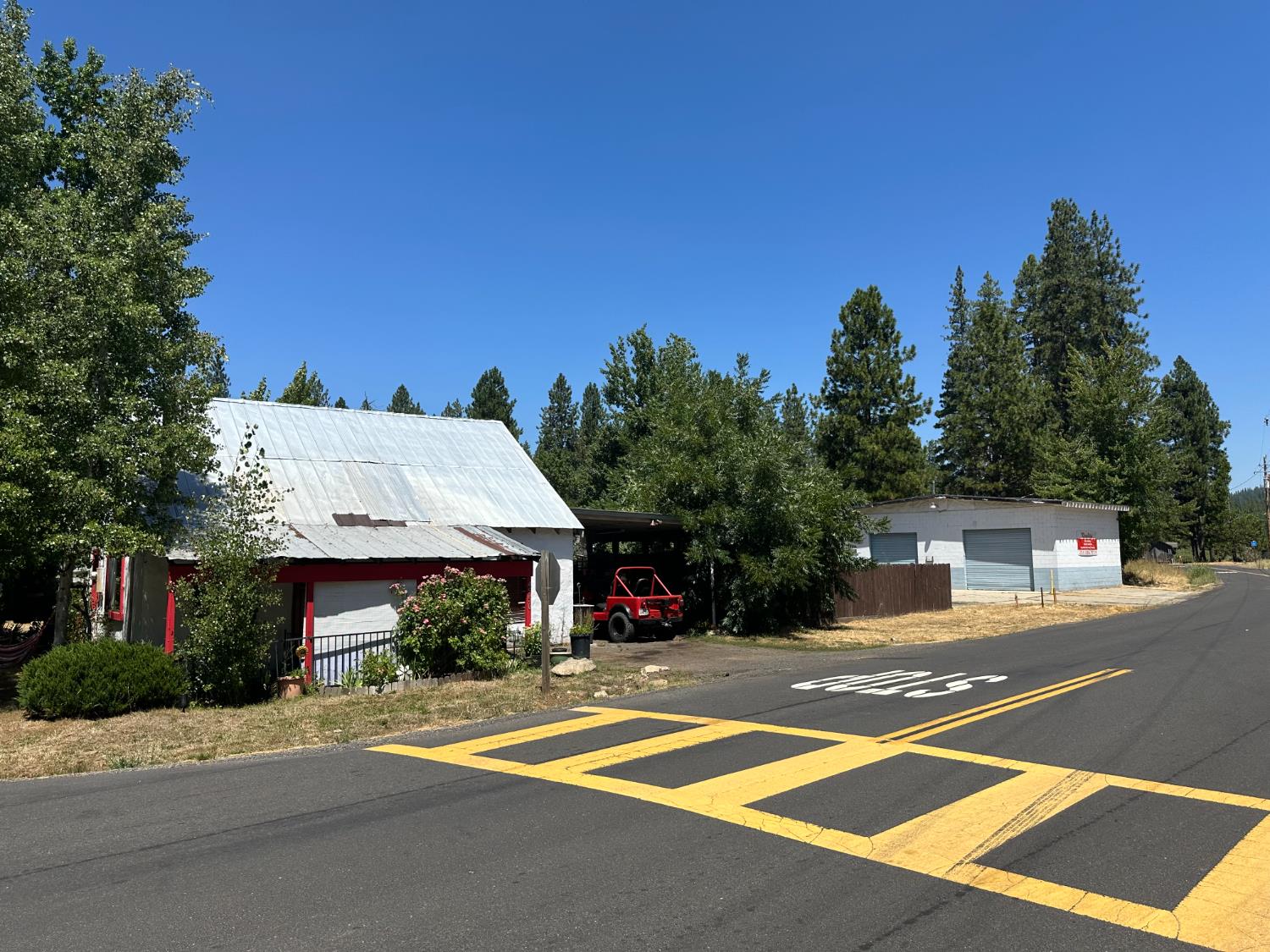 a view of a street with houses