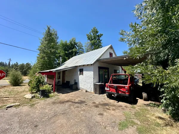 a view of a car in front of house