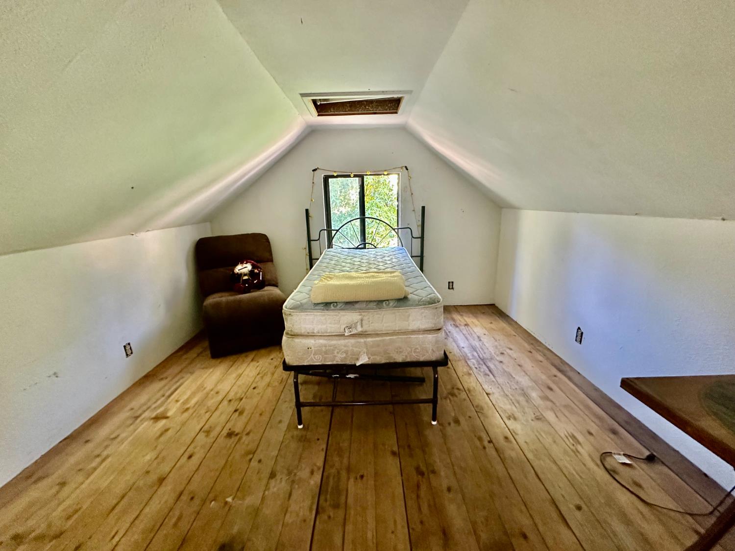 4550 Moran Road Avery, CA 95224 - Photo 23 of 31 a bed room with a bed and a window