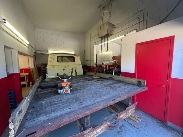 a bed room with a bed window and a television