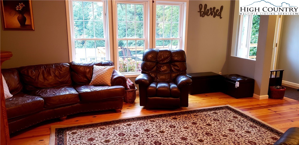 173 Country Road Deep Gap, NC 28618 - Photo 3 of 5 a living room with furniture and a rug