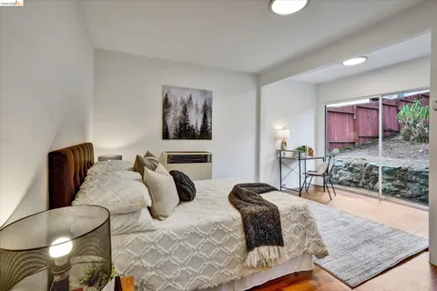 a bedroom with furniture and a couch