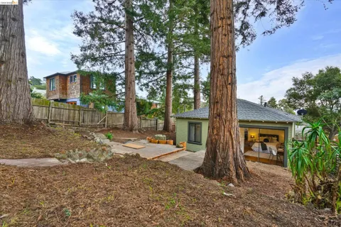 a view of a couches in backyard of the house