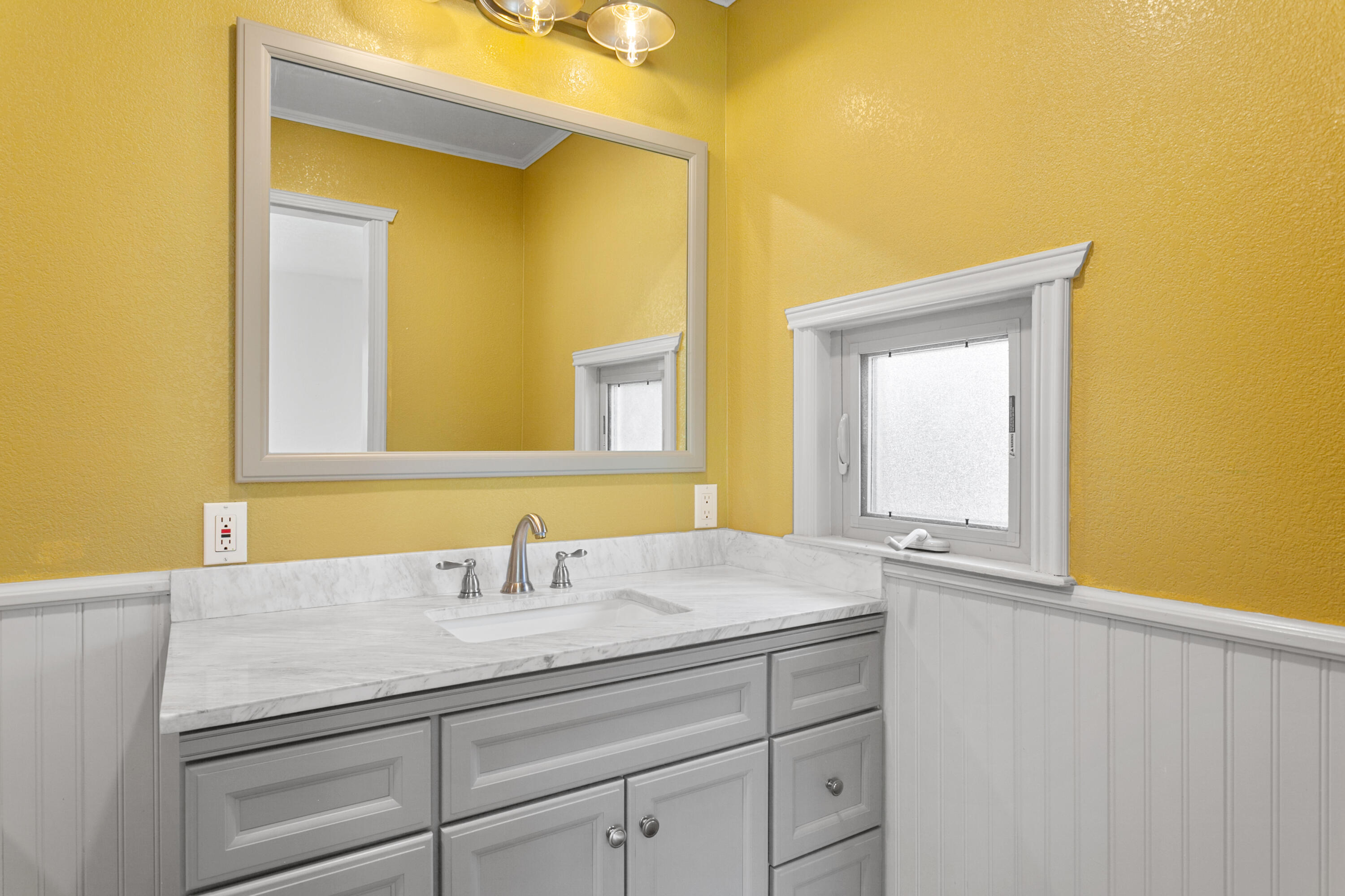 5858 Deschutes Road Anderson, CA 96007 - Photo 14 of 30 a bathroom with a sink and a mirror