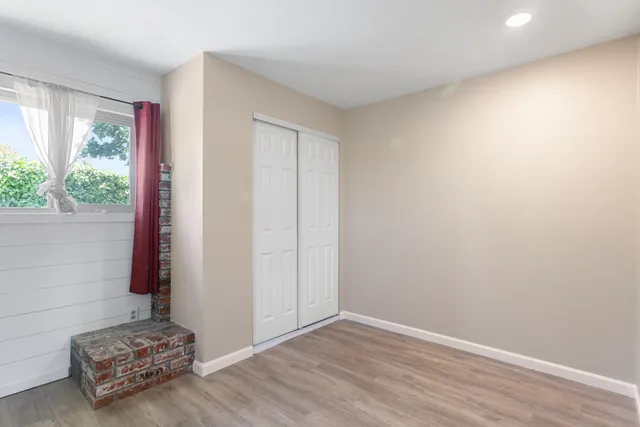 a view of livingroom with hardwood floor and window