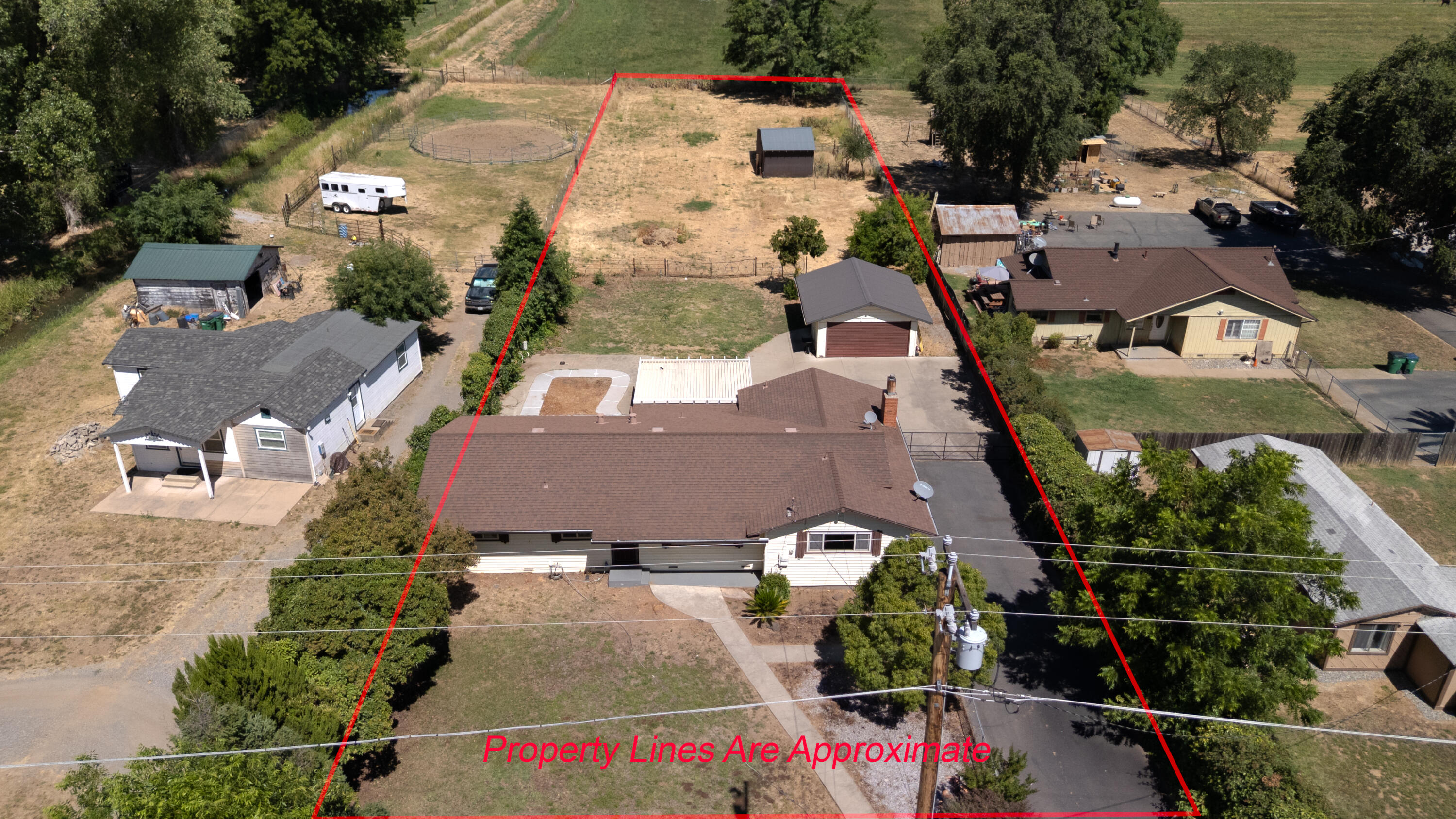 5858 Deschutes Road Anderson, CA 96007 - Photo 2 of 30 an aerial view of multiple houses with yard