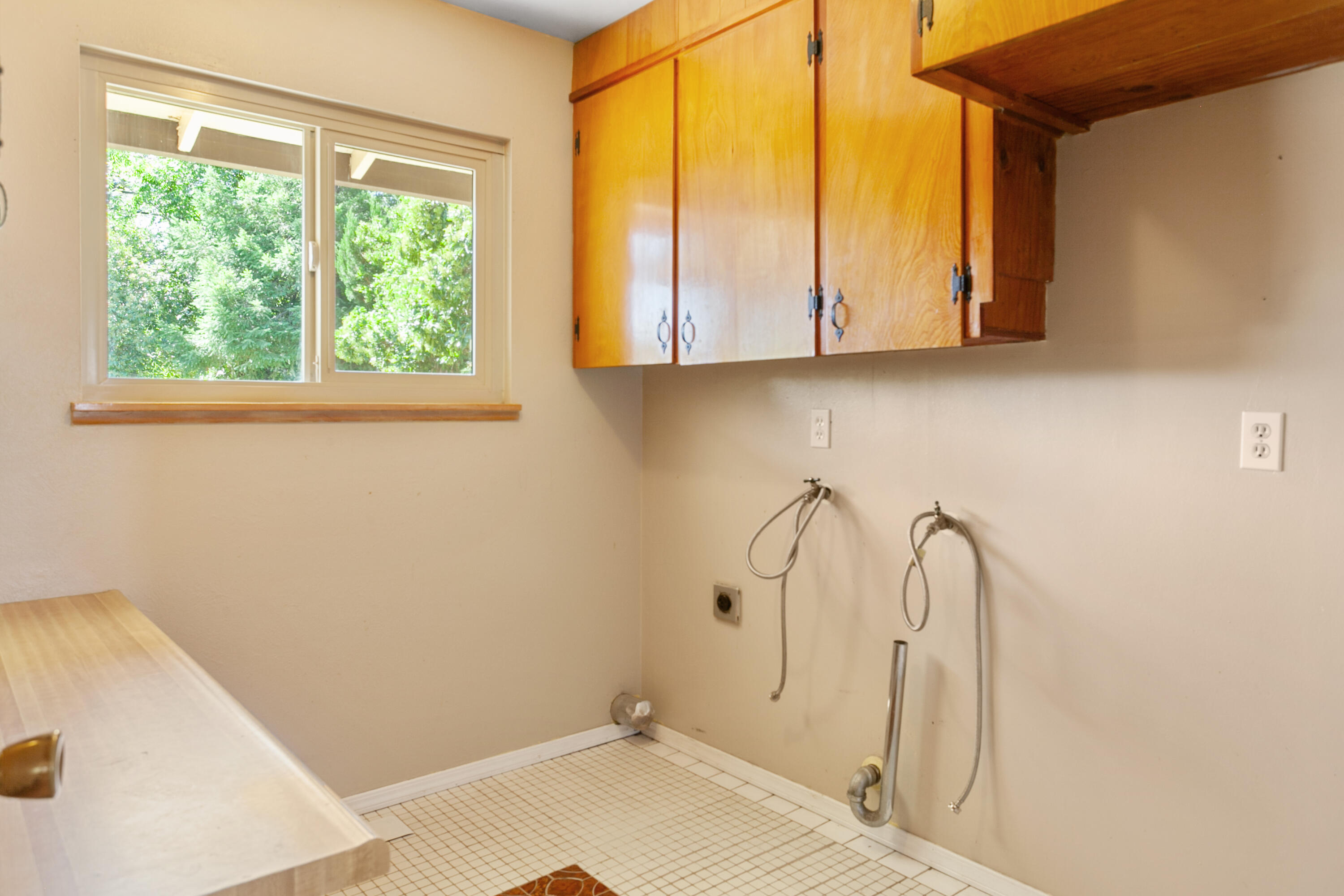 5858 Deschutes Road Anderson, CA 96007 - Photo 9 of 30 a bathroom with a window and a glass door