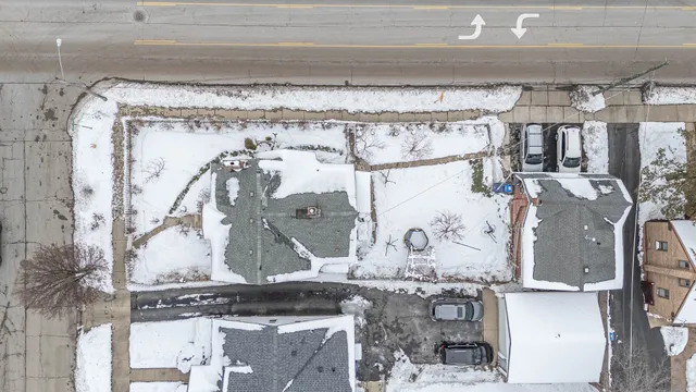 a view of yard and covered with snow