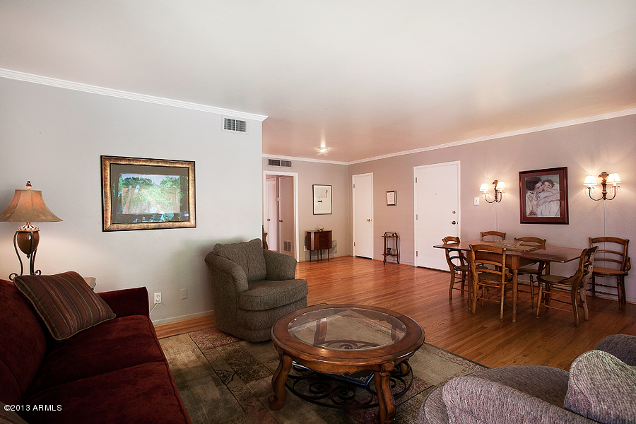 180 East Coronado Road, Unit 67 Phoenix, AZ 85004 - Photo 3 of 14 Living Room Flows into the Dining Room